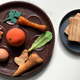 Illustration for article titled Improve your pandemic Passover with a candy seder plate